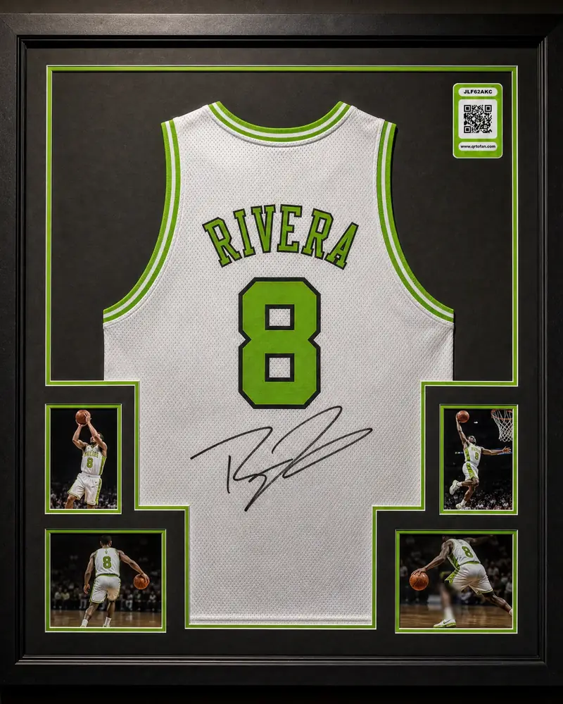A signed basketball jersey in a frame with a QRTOFAN tag